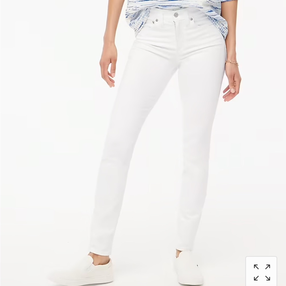 Mid-rise white skinny jeans